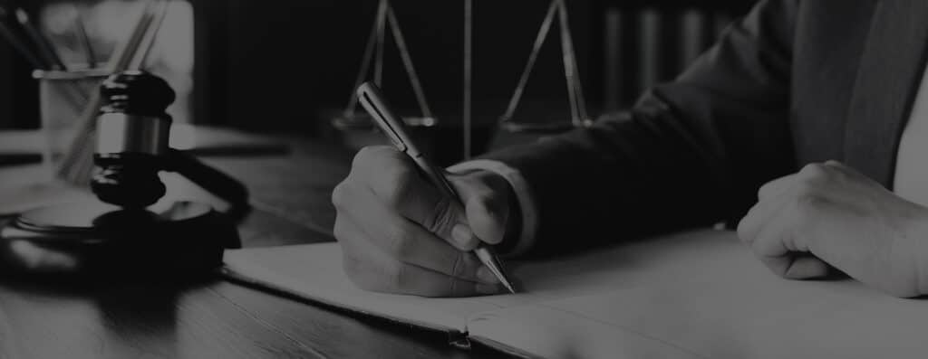 Lawyer working on paperwork at their desk